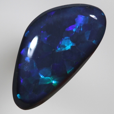 SOLID BLACK OPAL Flags of bright turquoise over royal blue